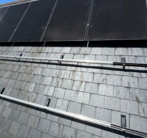 Slate solar roof including Genius Roofing solutions Solarflash Fixings